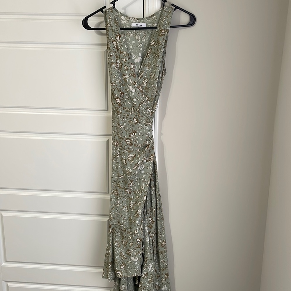 LIKE NEW. Worn once sage green floral wrap dress. Size S